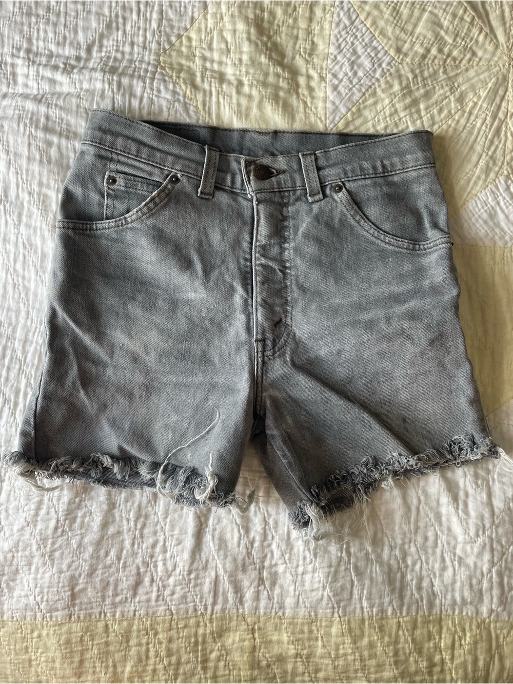 Orange Tab Levi’s cutoffs